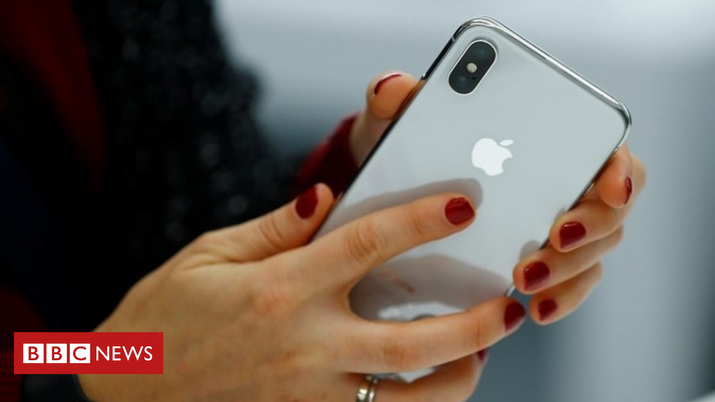 Apple blames China as it cuts forecast
